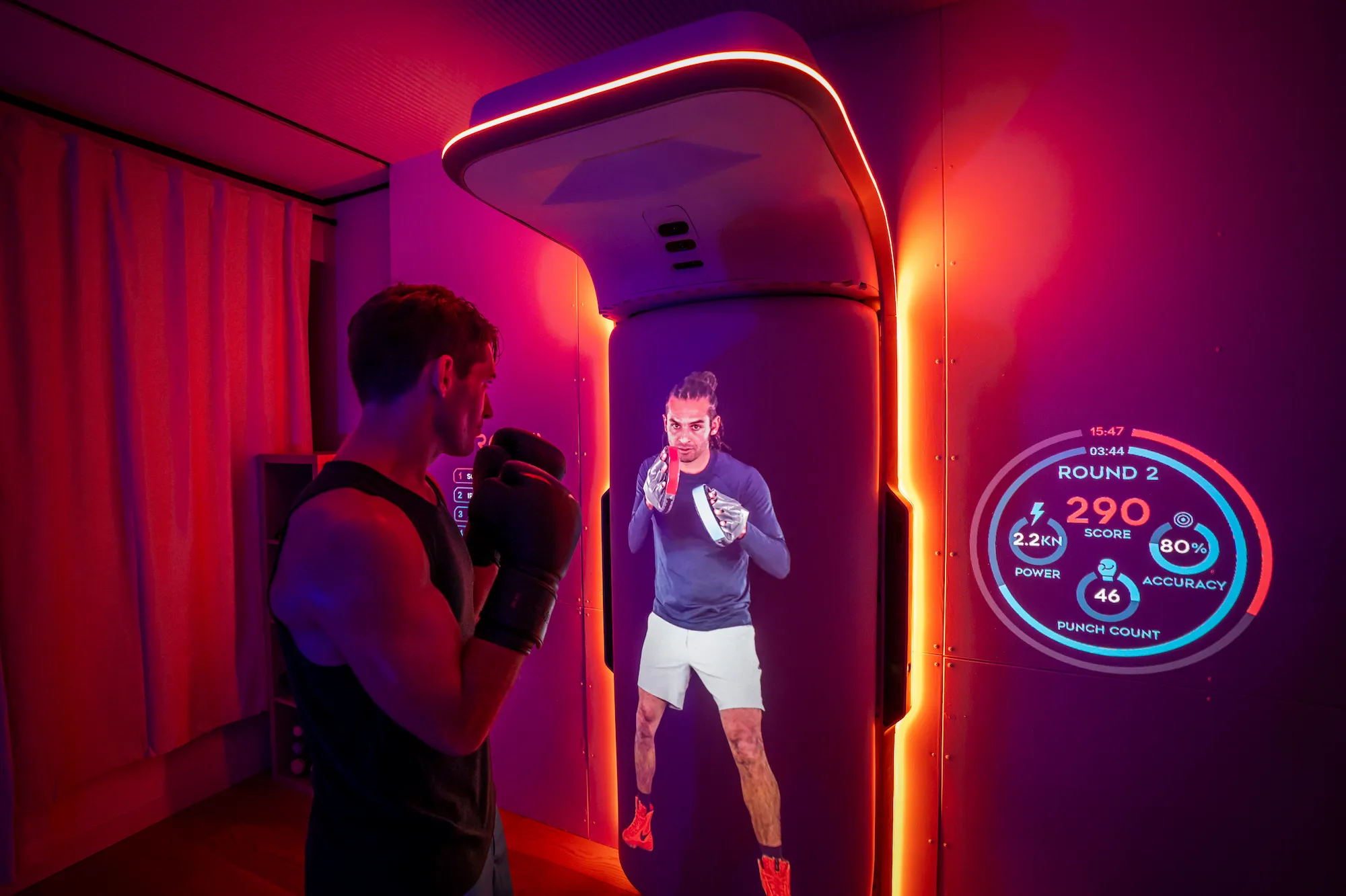 A man practicing technical boxing on Growl's boxing bag